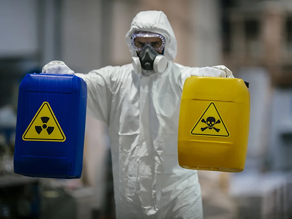 Biohazard cleanup technicians in protective equipment at a remediation scene in Everett, WA